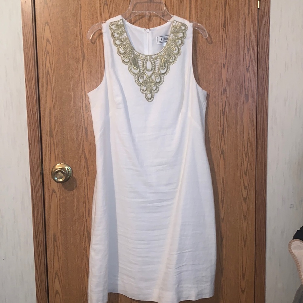 white dress with gold collar